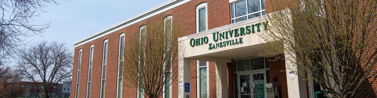 exterior photo of brick campus building