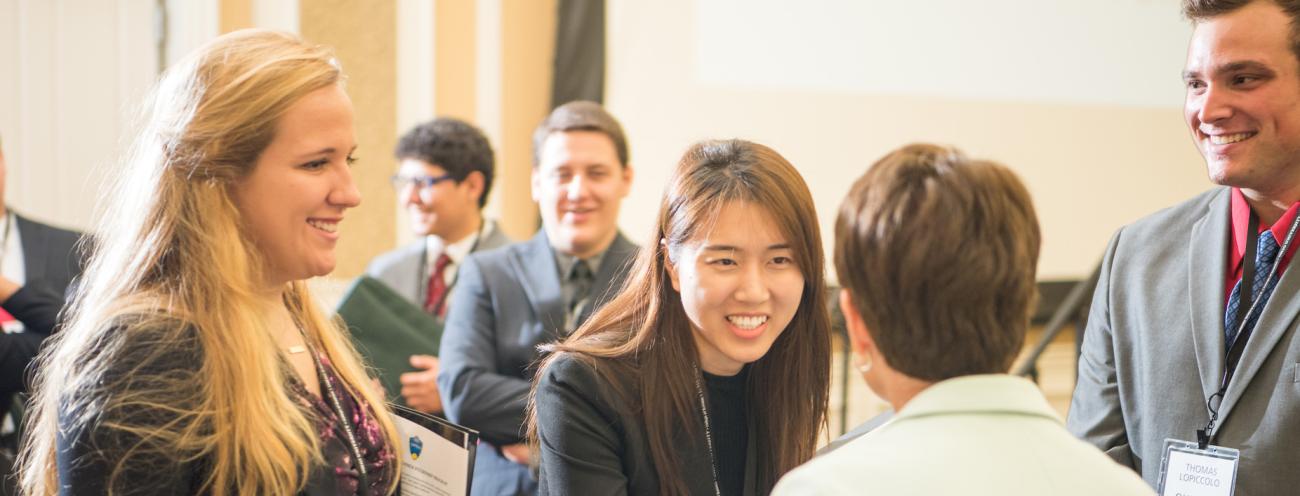 Students talking to employers