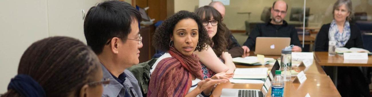 Faculty have a discussion during a Bruning Teaching Academy meeting