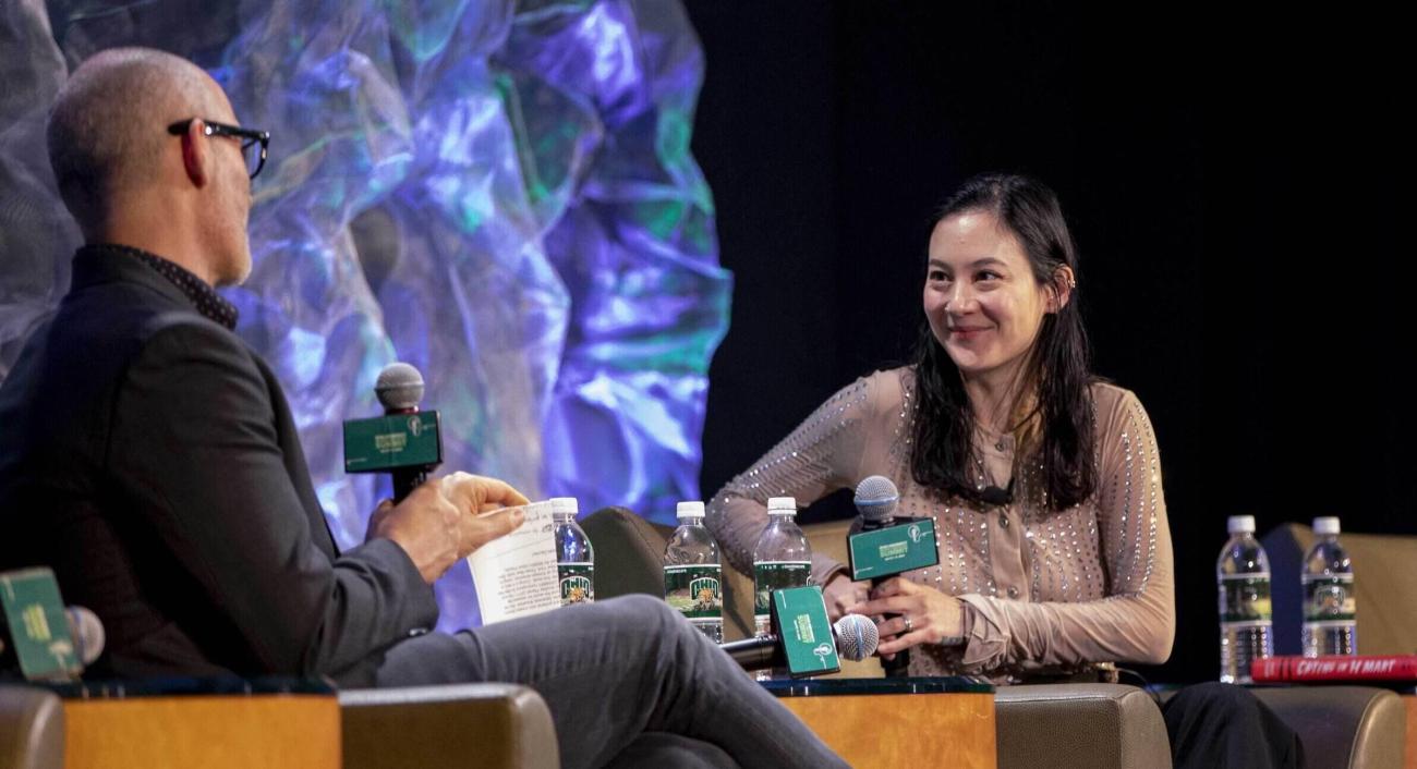 Michelle Zauner and Josh Antonuccio talk on stage