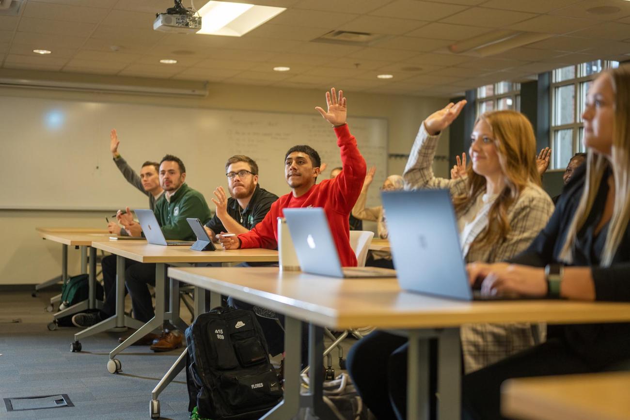 Students Raising Hands