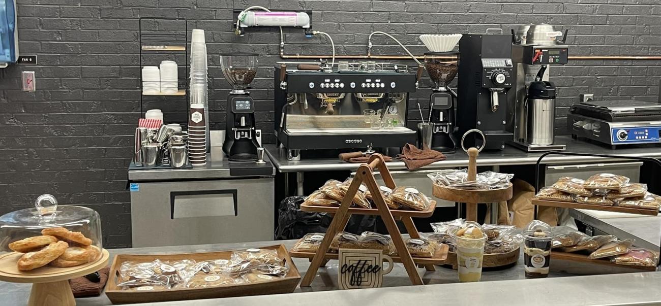 pastries on the counter at coffee shop