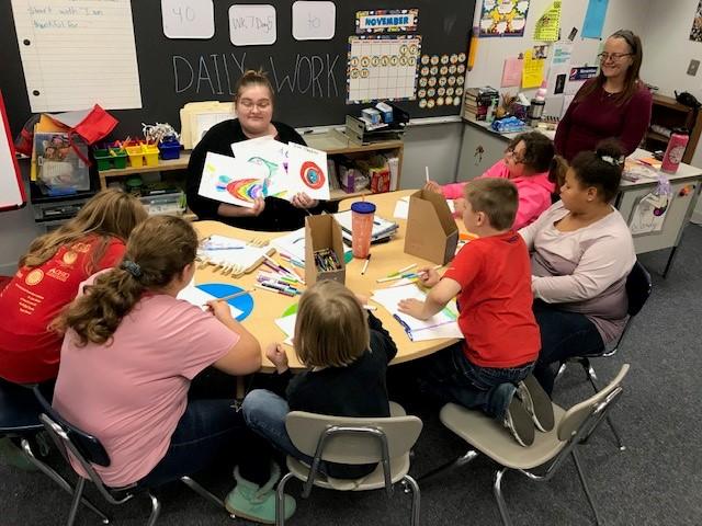 Students working on their art portfolios