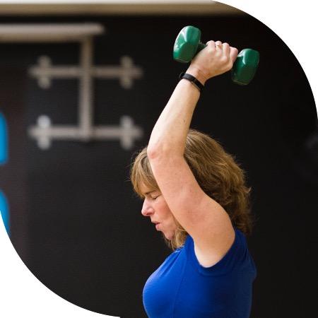 Member doing tricep extensions