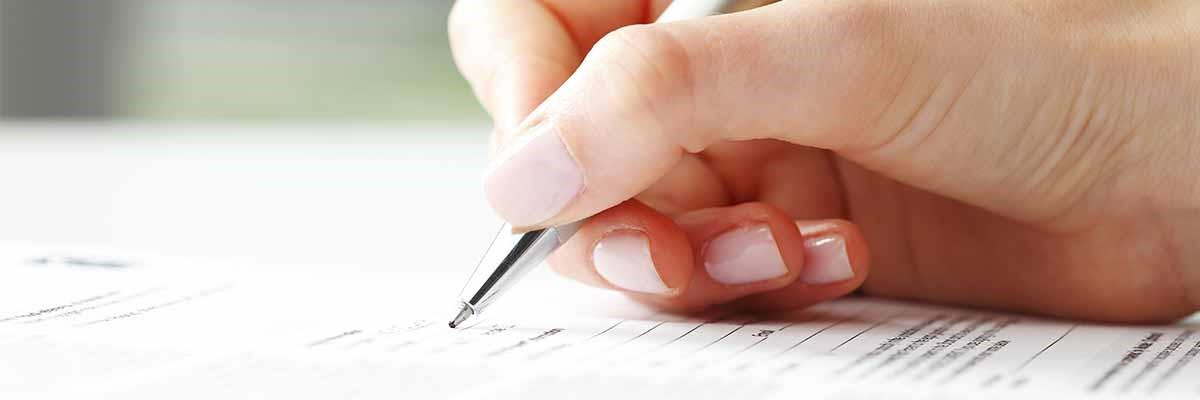 hand filling out form