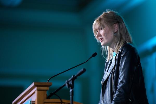 Individual speaks at Take Back the Night 2019 