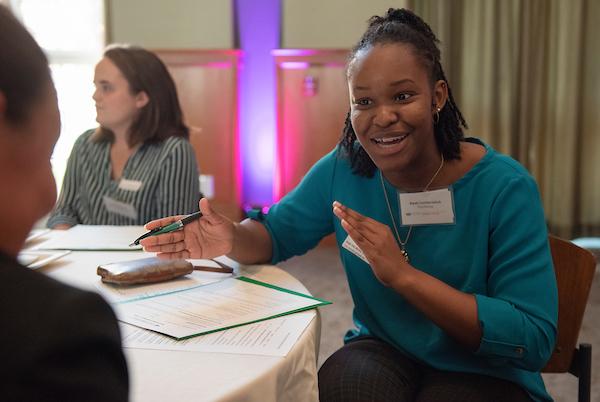 Individuals discuss at Women's Meet and Greet 2019 