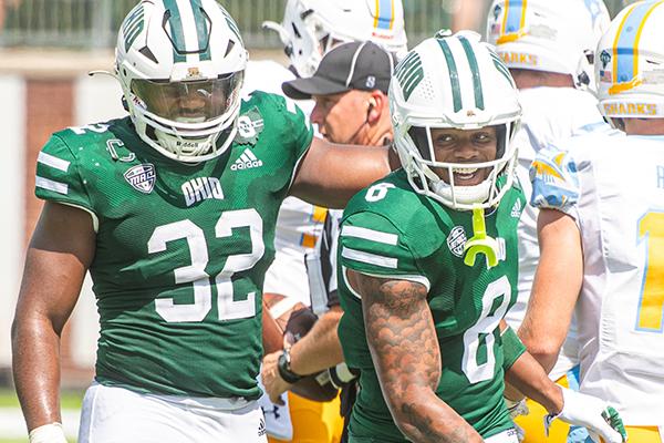 OHIO football players react during the first home game of the year.