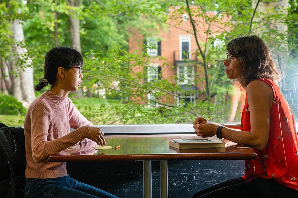 advisor and student talking