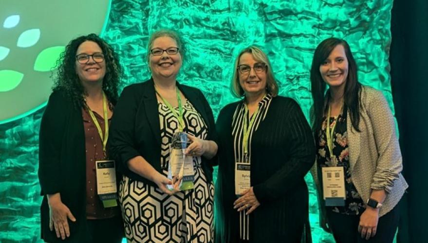 OHIO BSC Leadership Team members receiving award at CACUBO