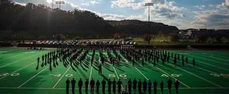 Practice field full of marching band members at Pruitt Field