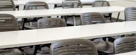 Close-up of tables and chairs in Ellis Hall classroom