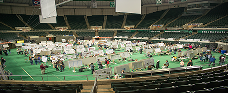 Inside the Convocation Center, set up with chairs for Commencement ceremony
