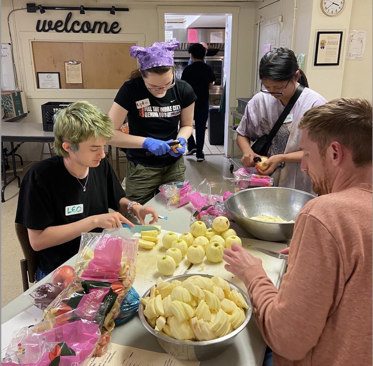 Students work in a kitchen together