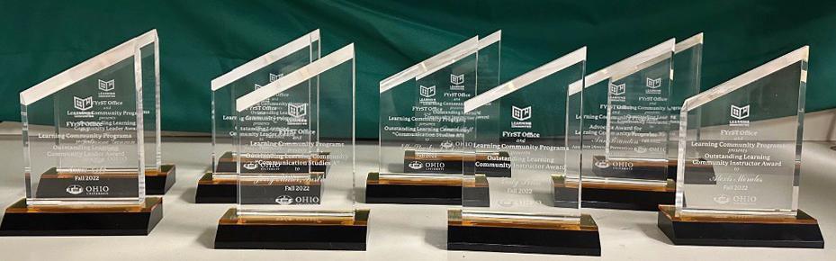 Learning Community awards and glass trophies