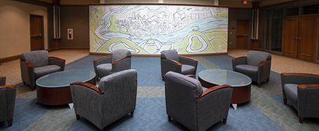 Baker Theater Lounge, featuring lounge chairs and round coffee tables