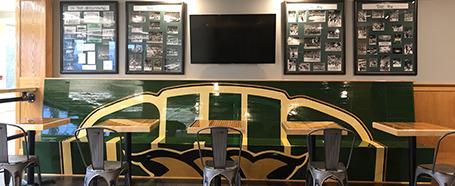 Sports memorabilia on the walls inside Hardwood House