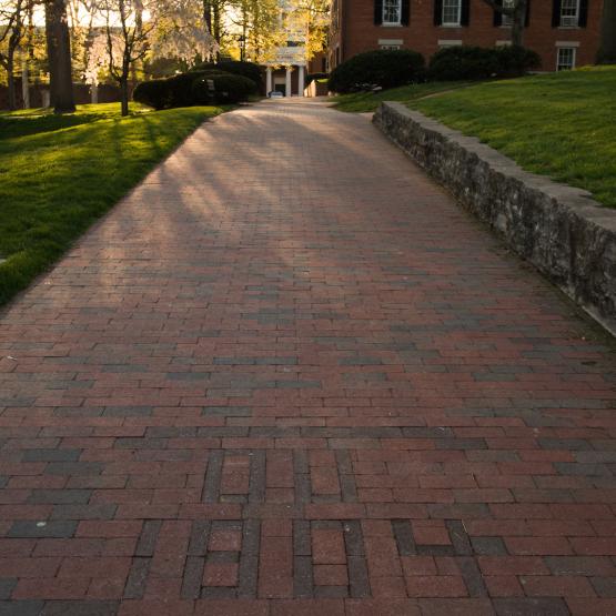 1804 written in bricks on a brick pathway on College Green