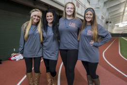 Four students on running track