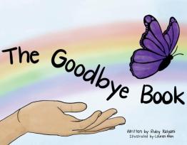 Rainbow in background with hand releasing butterfly.