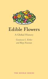 Yellow cover with drawing of multi-colored flowers in a bowl.