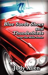 Classic red car with high heel shoes on hood.