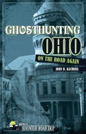 Spooky building and figure on cover.