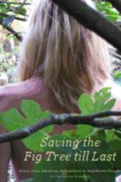Woman with blond hair looking away standing behind branch of tree.
