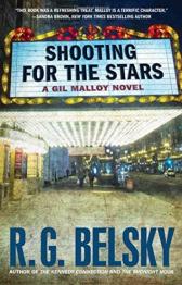 Book title lit up on movie theater sign.