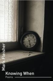 Clock sitting on window sill. 