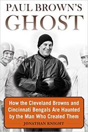 Football players on cover and Paul.