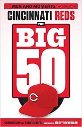 Cincinnati Reds baseball hat on cover.
