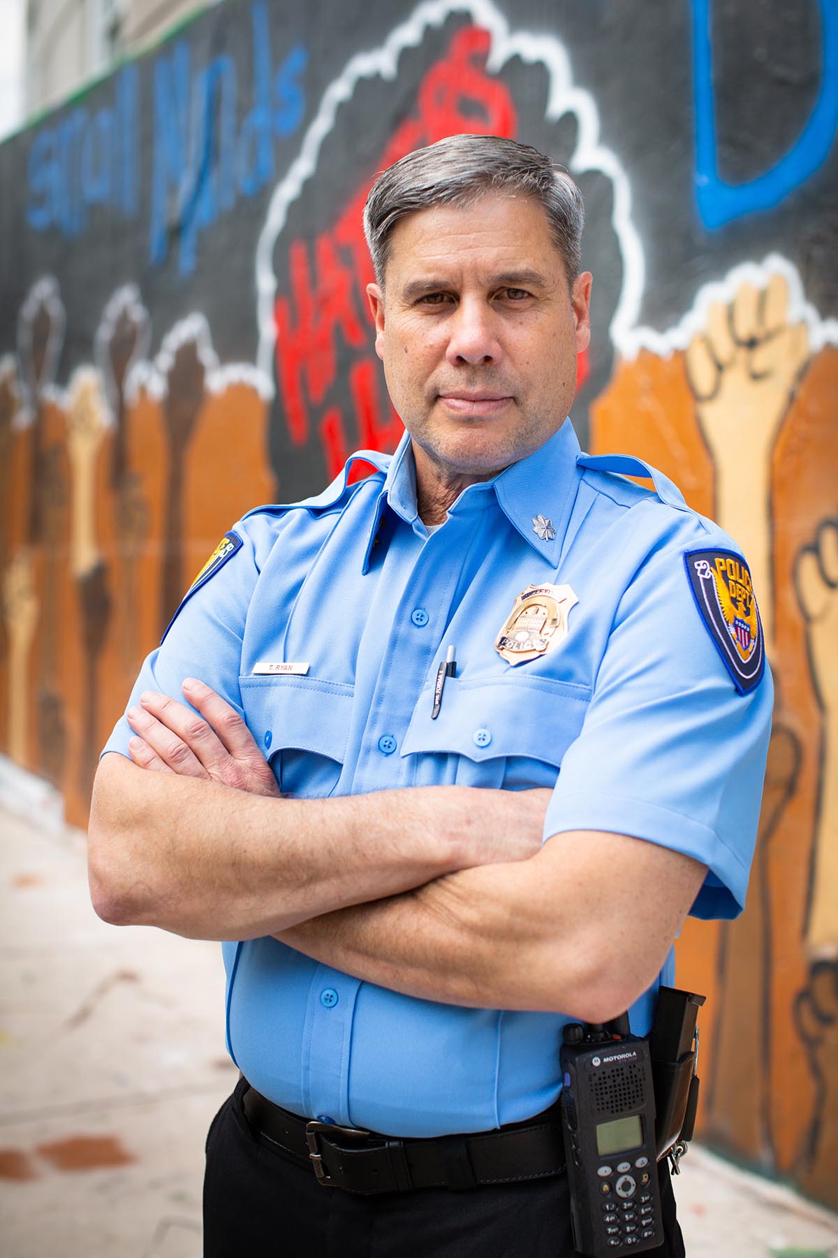 Actor Tim Perez-Ross in front of Graffiti Wall set, painted by Denver Bastion