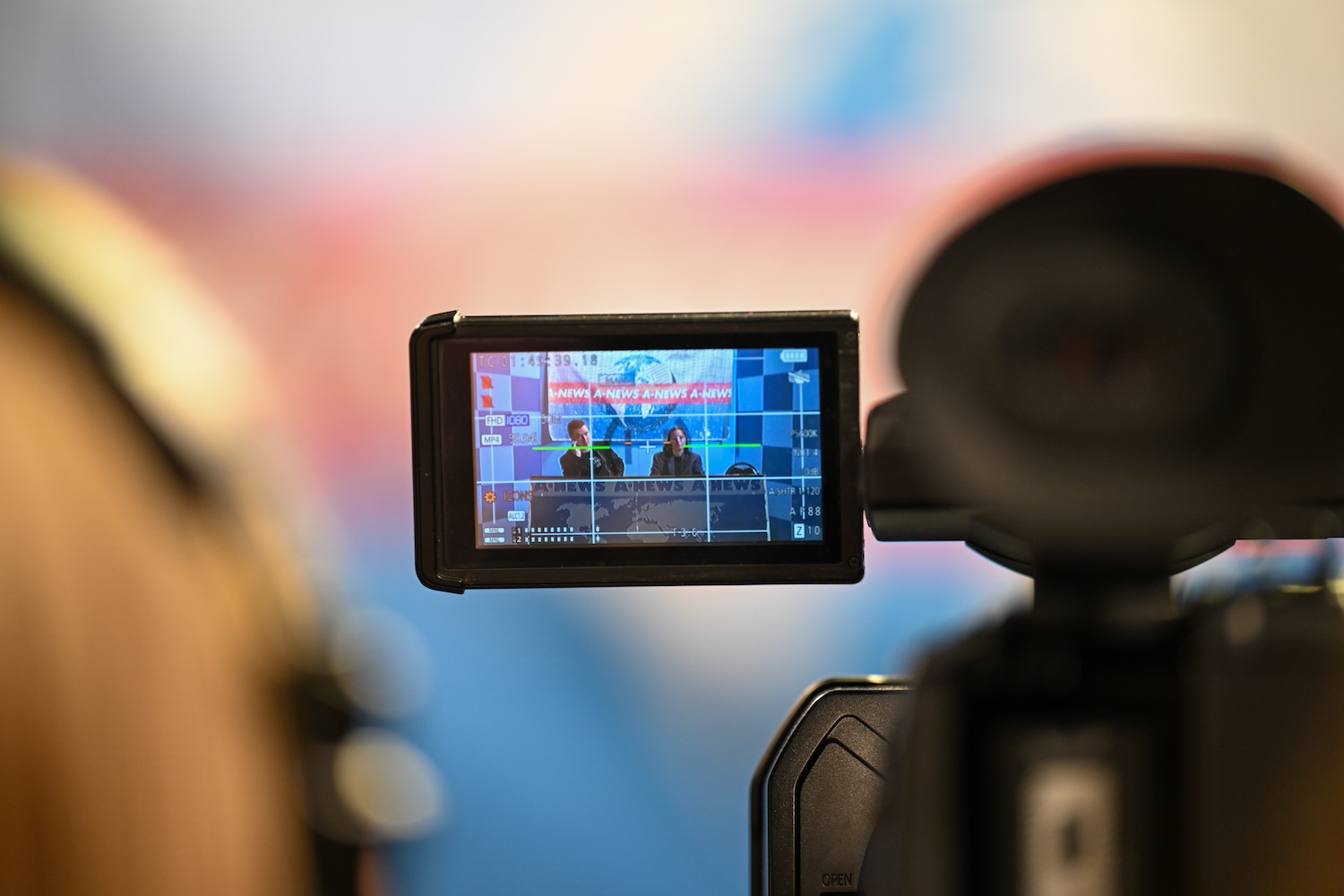 Camera focused on newsroom