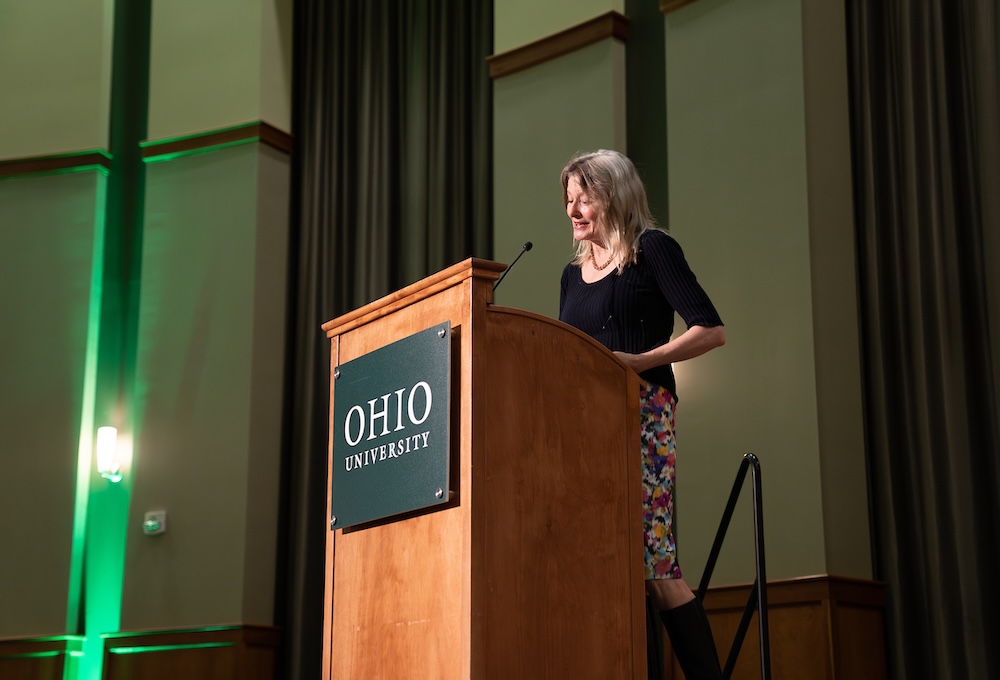 Jennifer Egan speaking at a podium