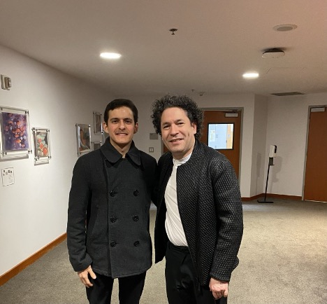 Alejandro Orta poses with Gustavo Dudamel