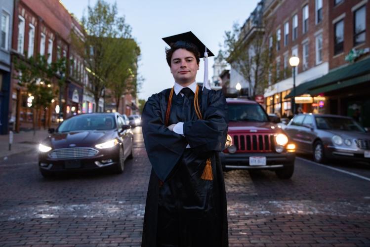 OHIO graduate Matt Geiger stands on Court Street in Athens, Ohio.