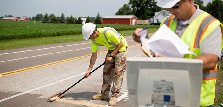 ORITE researchers work on a roadway.