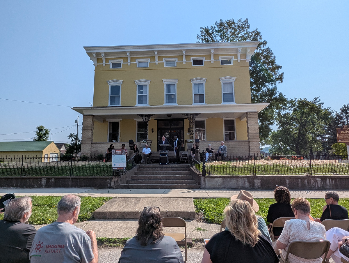 Marty Conley speaks at the dedication ceremony outside of the Campbell House