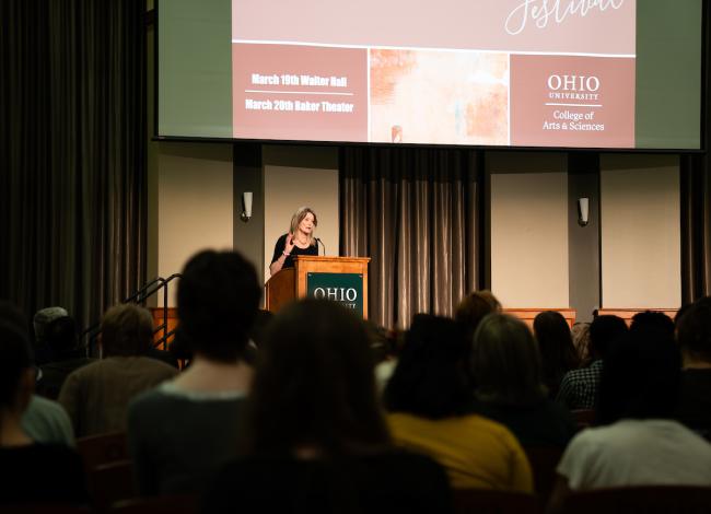 Jennifer Egan speaks from a podium