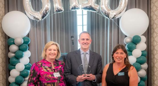 President Lori Stewart Gonzalez, Jim Lynch and Voinovich School Dean Tracy Plouck