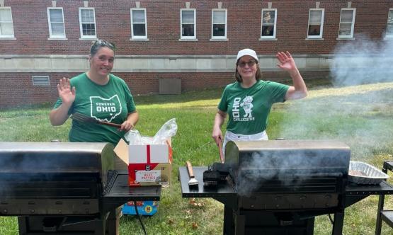 Dean Roberta Milliken and another individual are shown cooking on a brill outdoors at OHIO Chillicothe
