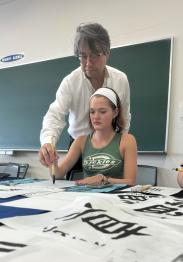 Student learning to write in Japanese