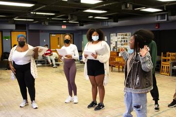 Student and professional actors rehearse together in Kantner Hall in the weeks leading up to opening of Hotel Berry.