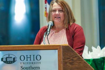 Dr. Haugen at podium