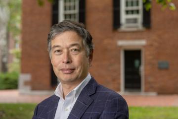 Dean Matthew Ando. outside his 186-year-old office in Wilson Hall.