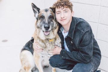 Matt Nelson is shown next to a dog