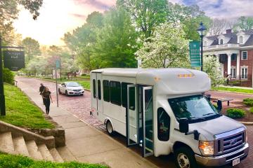 An OHIO shuttle picks up passengers near Scripps Hall
