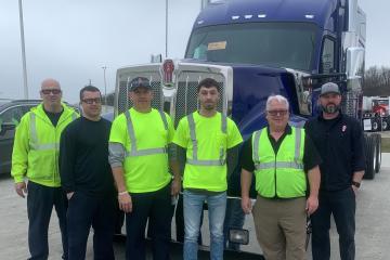Blake McCathren and Kenworth employees