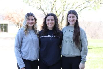 Three sisters standing together